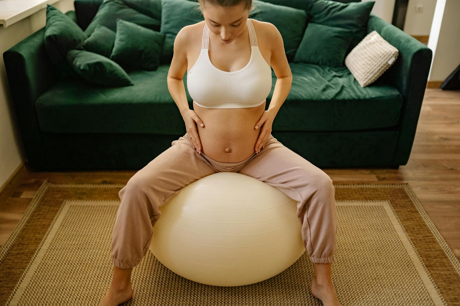 pregnant woman exercising using a stability ball