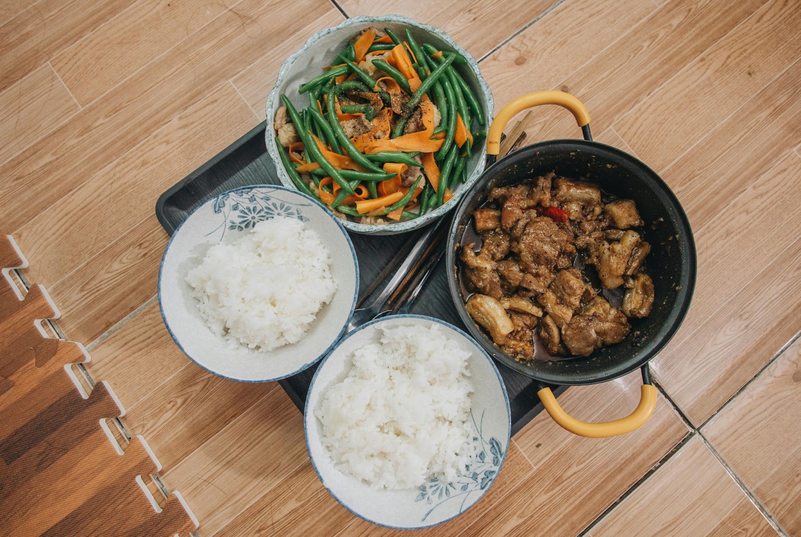 4 plates with different types of food rice, meat, and vegetables