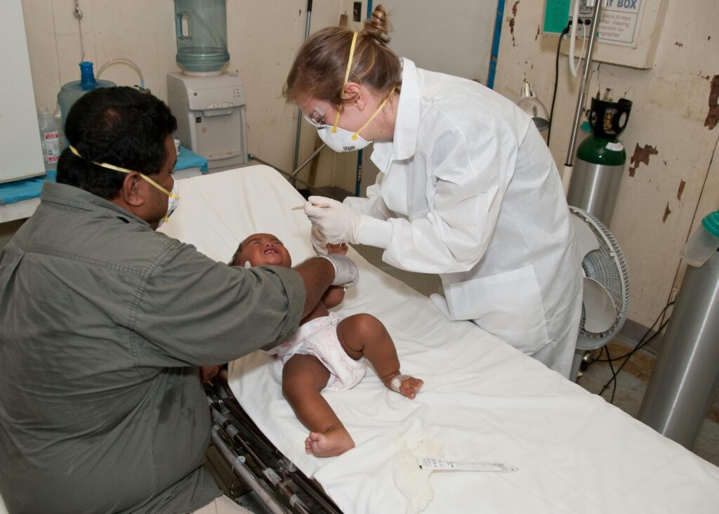 a baby getting a checkup in hospital