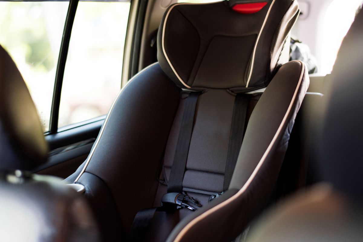 a baby car seat fitted inside a car