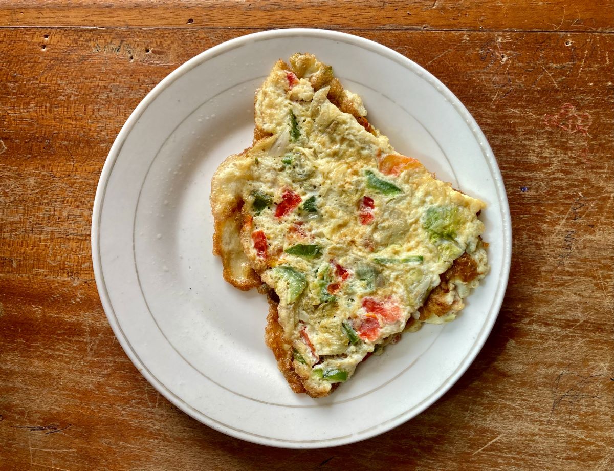 veggie omelet placed on a plate